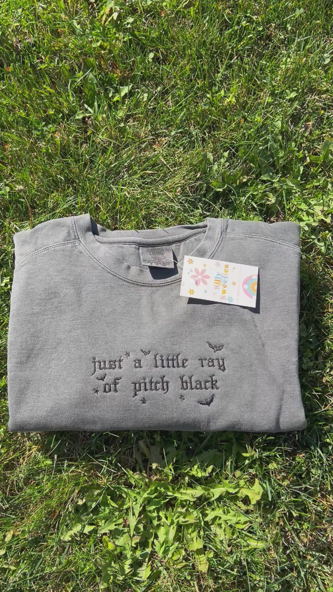 Just a Little Ray of Pitch Black Sweater Embroidered